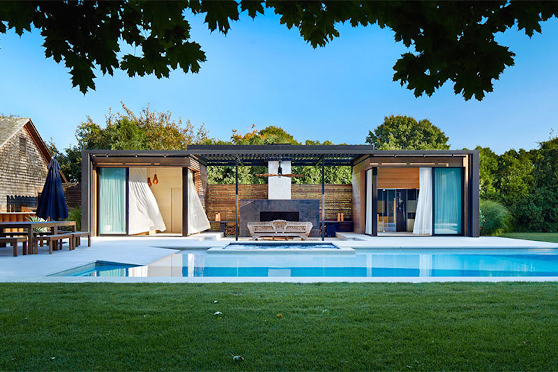 A modern pool house in Amagansett, NY designed by iCrave and photographed by John Muggenborg.